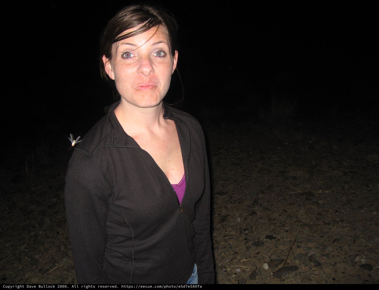 Woman Making a Pouty Face at Night Outdoors
