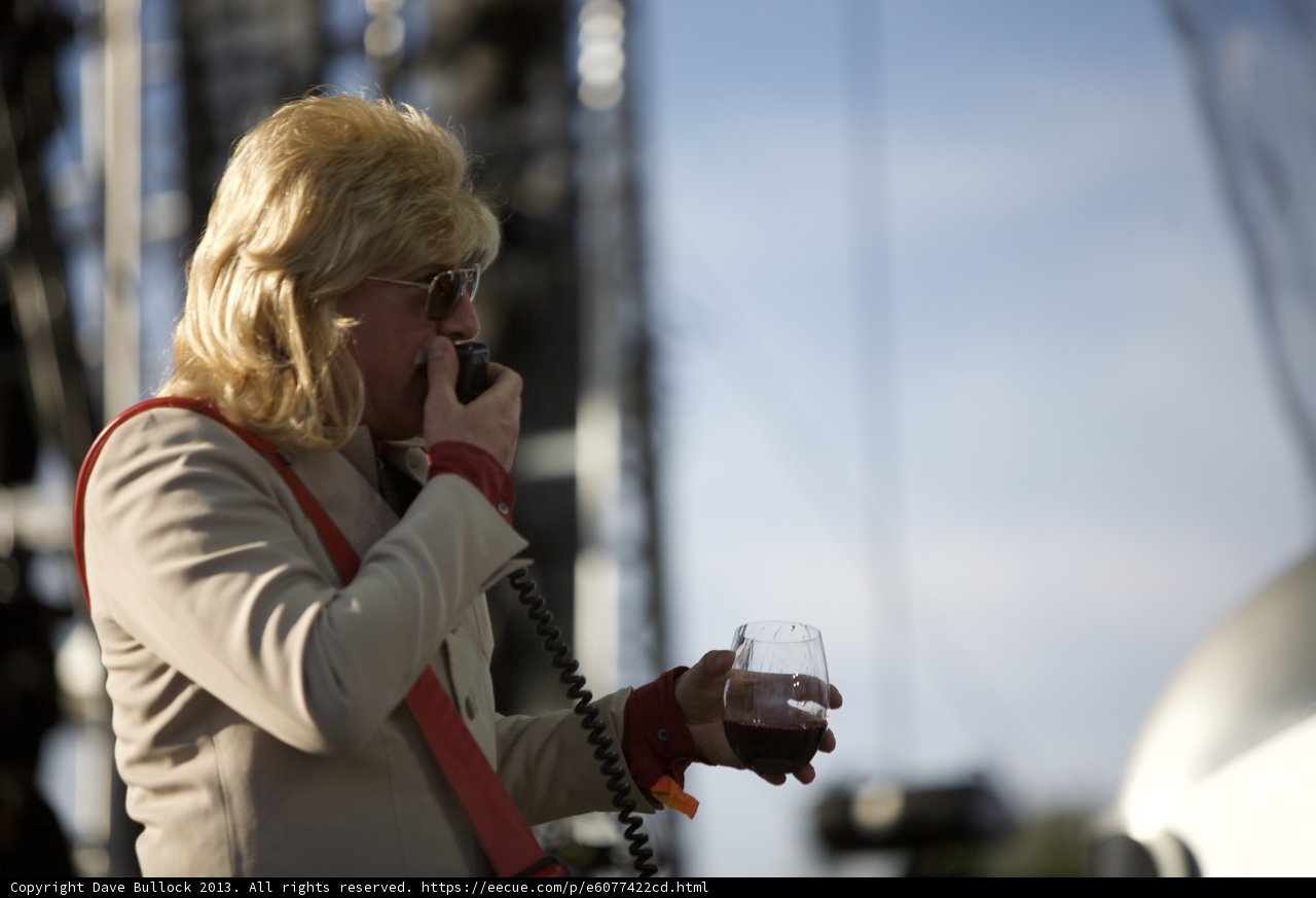 Blonde on the Phone with a Glass of Wine
