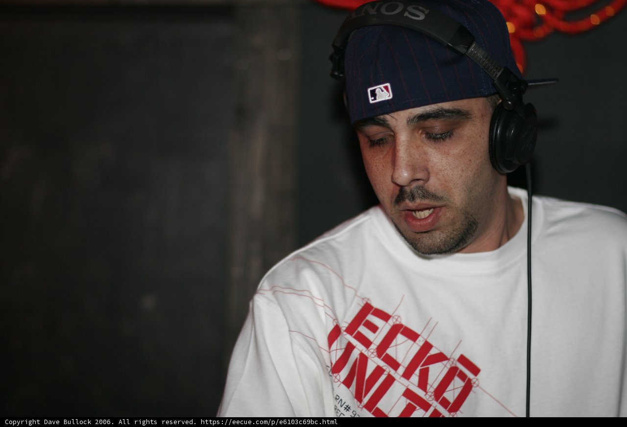 Eric S in White T-Shirt and Baseball Cap