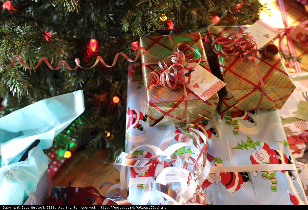 A Festive Christmas Tree Loaded with Gifts