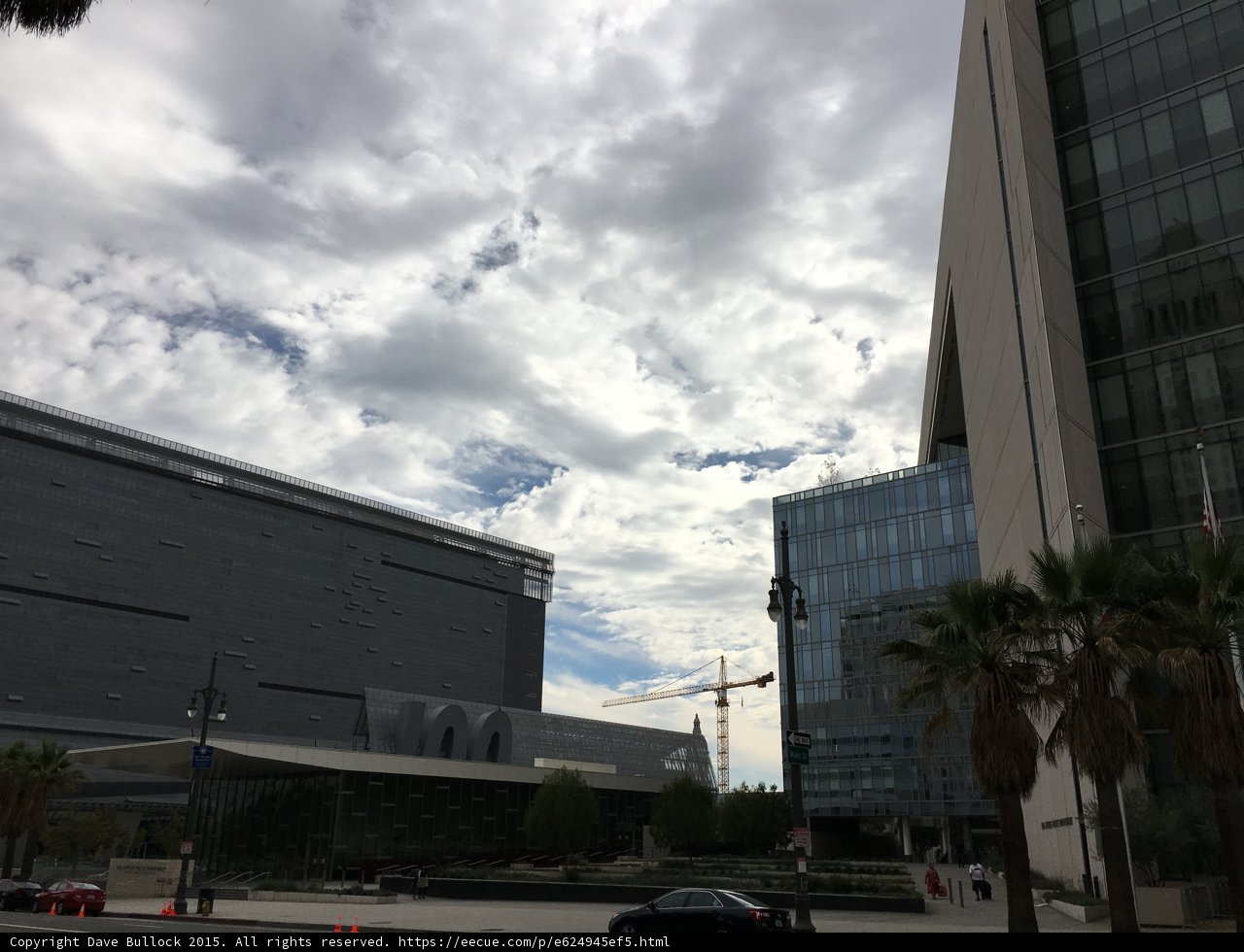 Building Triumphantly Rises Amidst Cloudscape