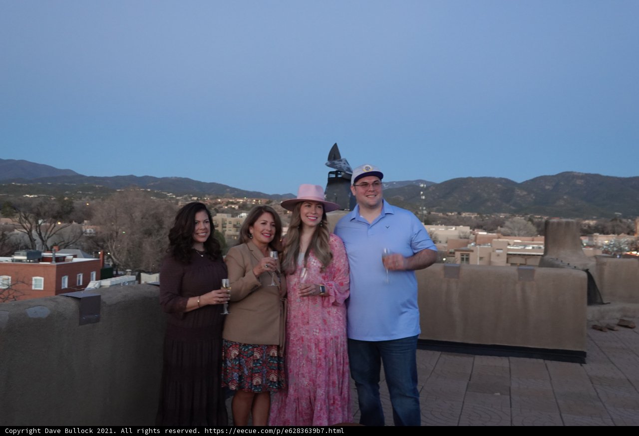 Rooftop Family Portrait with Majestic Mountain Range