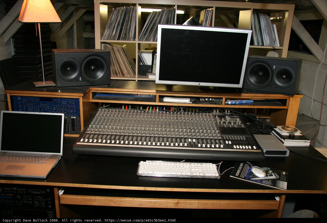 Black Desk with Electronics and Speakers