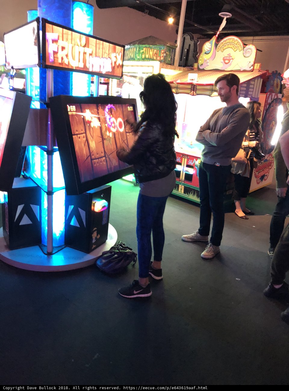 Sneaker-Clad Woman Takes on Arcade Game