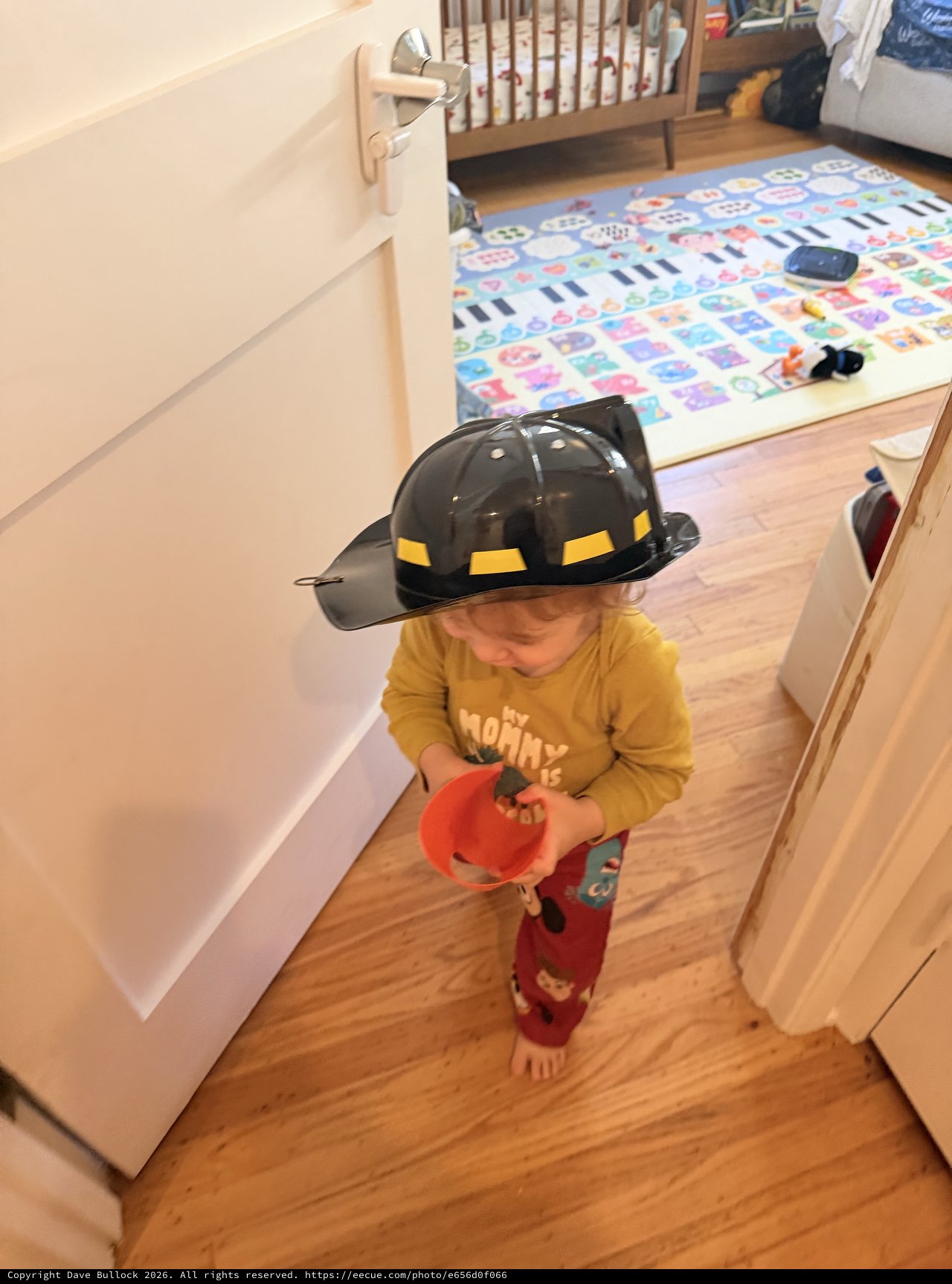 Little Firefighter Ready for Trick-or-Treating at Home
