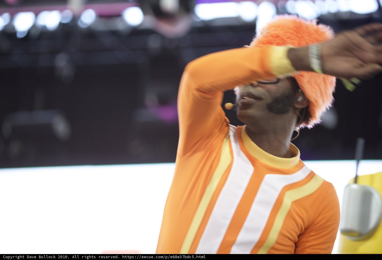 Orange and White Shirt Man Takes the Stage at Coachella