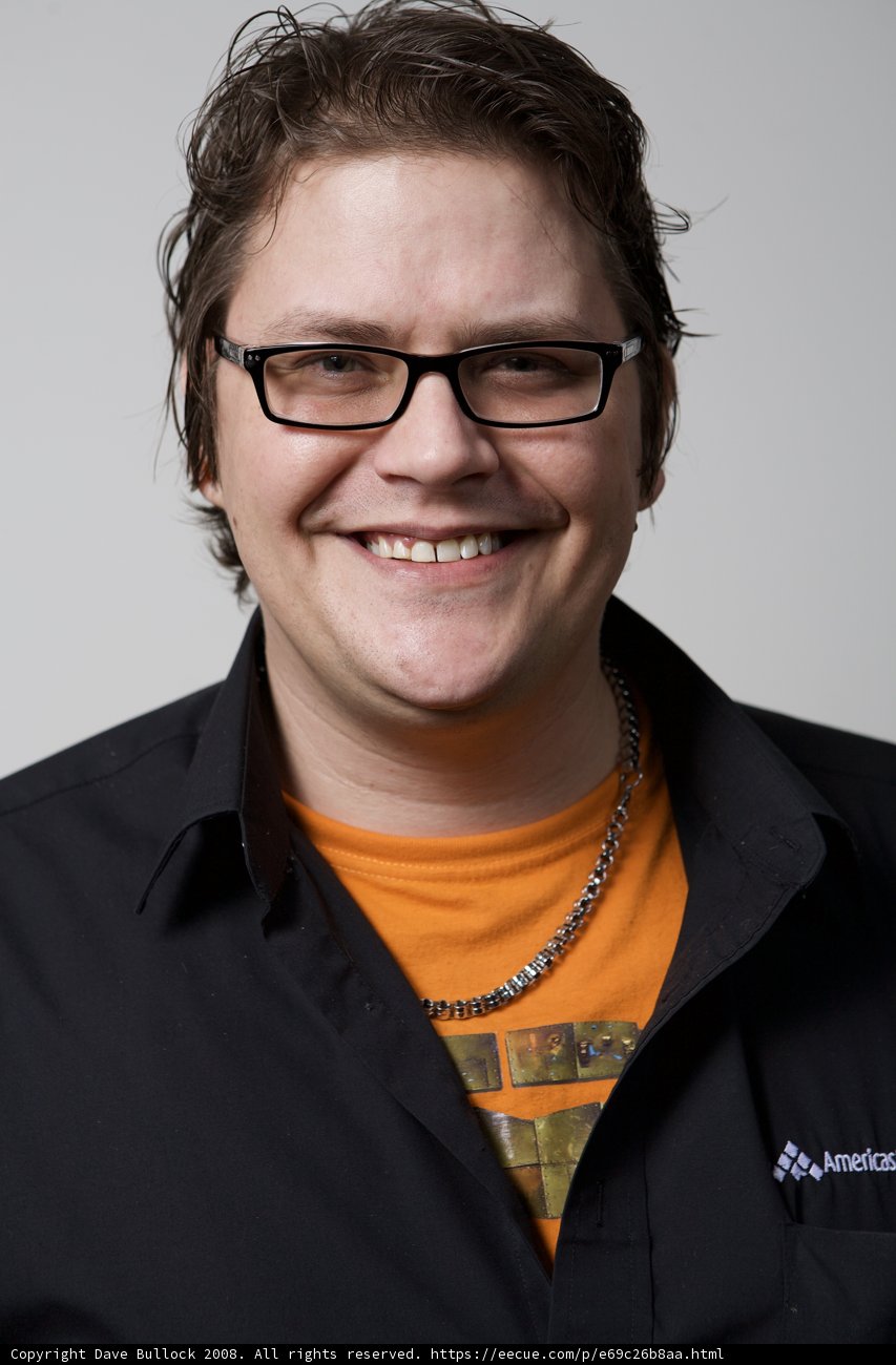 Smiling Man in Glasses