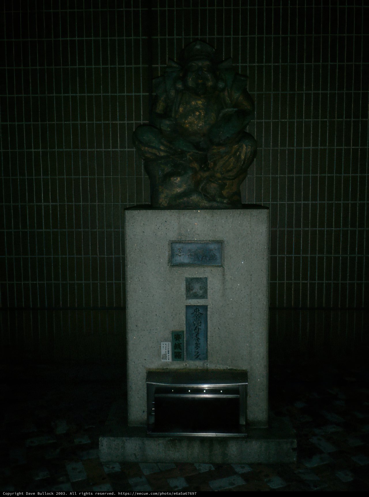 Statue atop a Water Machine