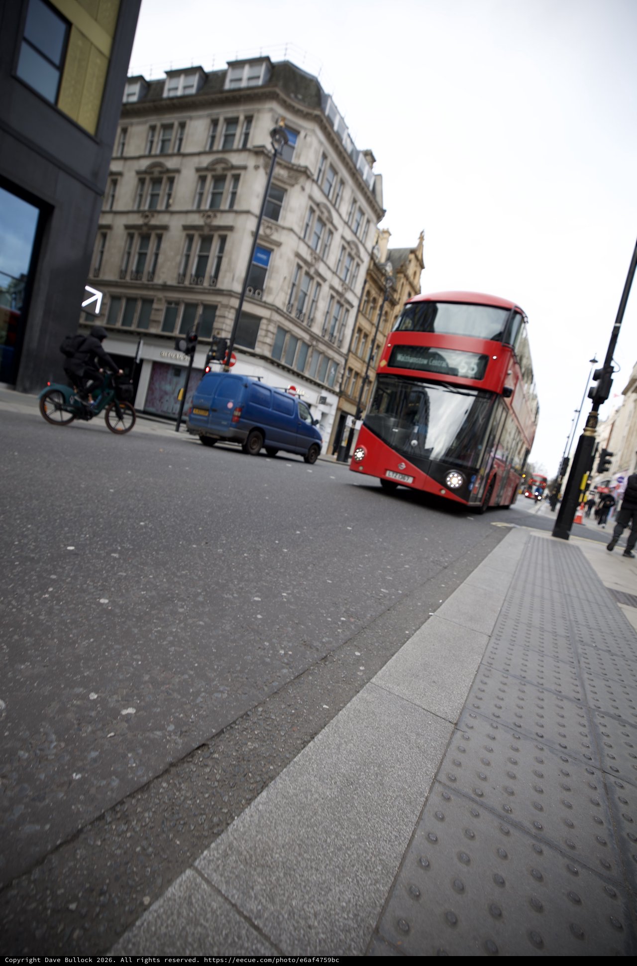 Modern Red Double-Decker Bus on London Street