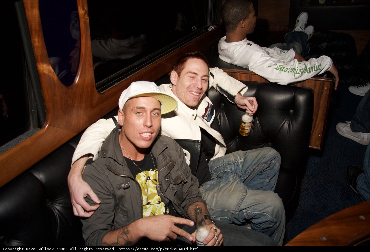 Two Men Relaxing on a Vintage Couch