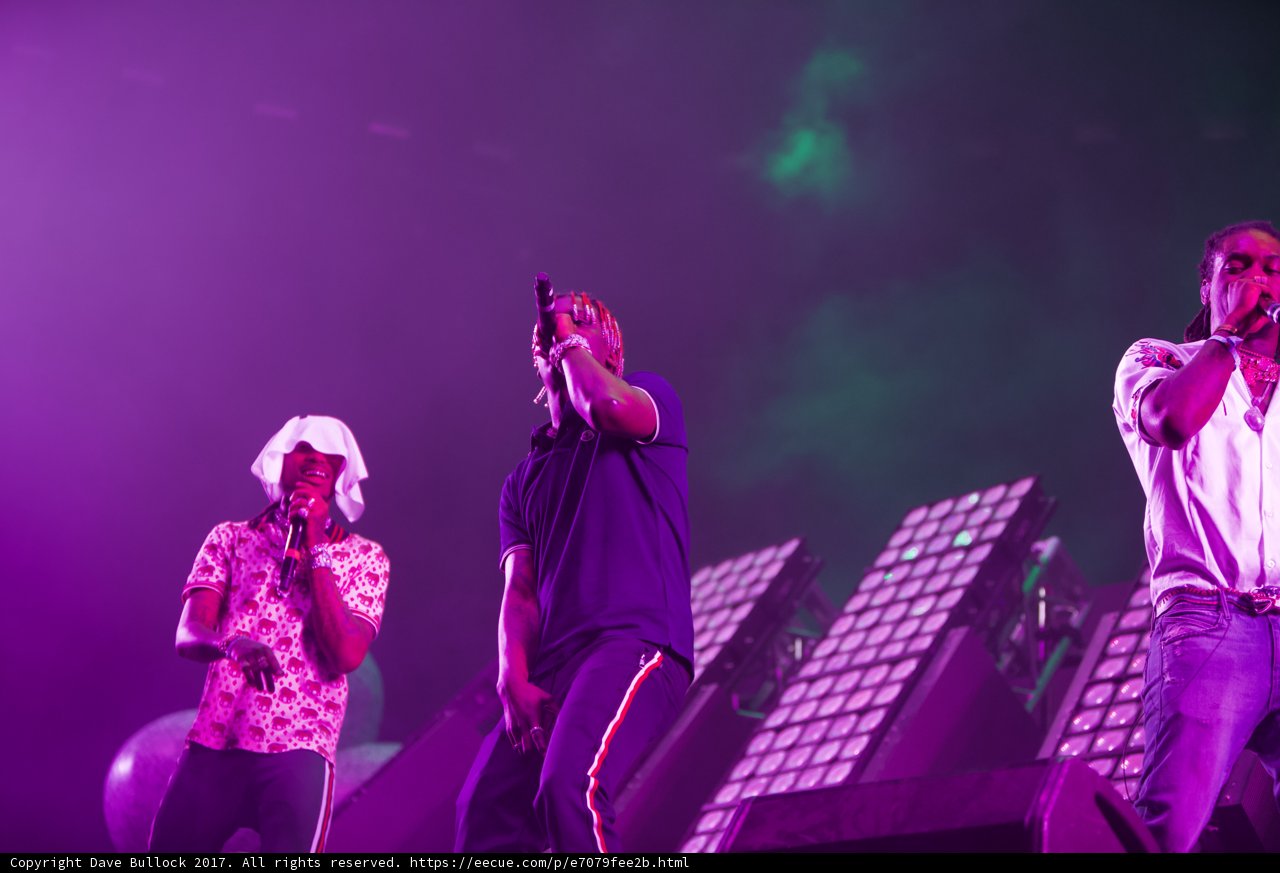Three Men Rocking the Crowd