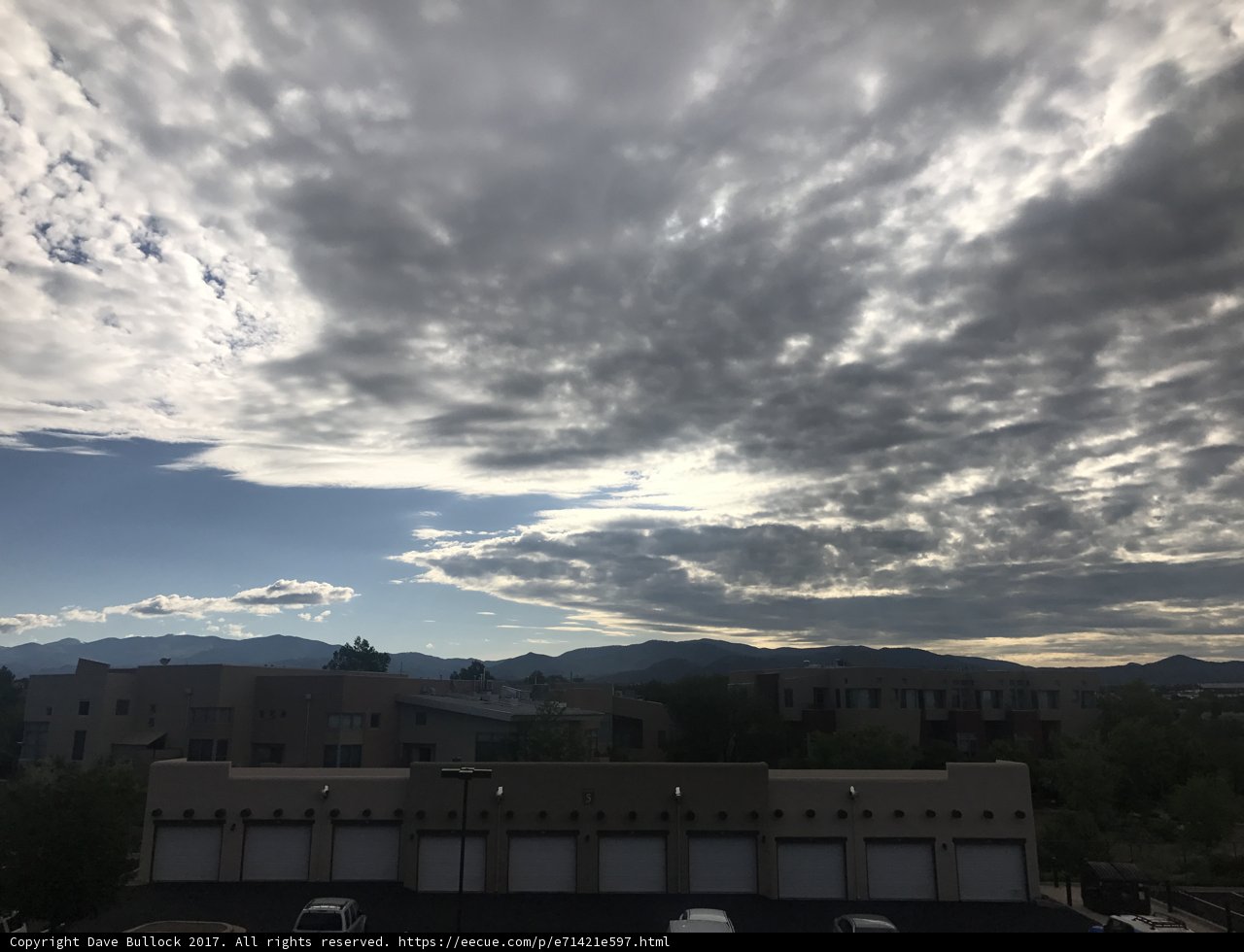 Majestic Mountains and Cumulus Clouds