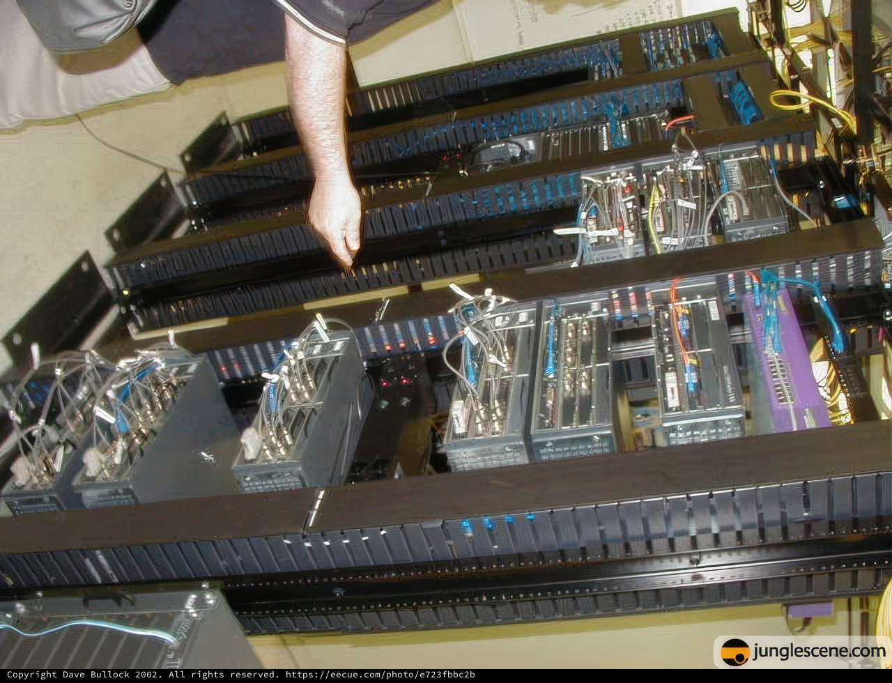 Man in front of the Server Rack