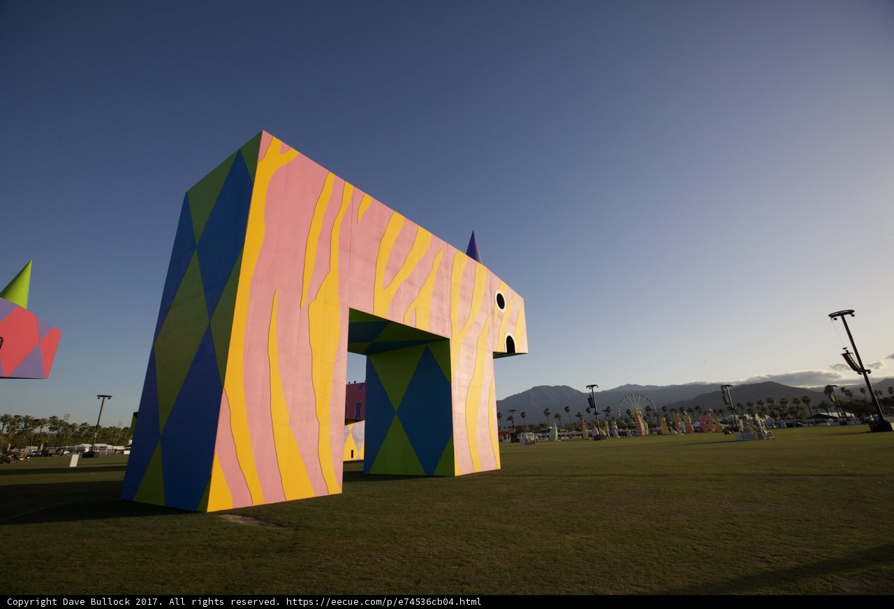 Vibrant Equine Sculpture in a Serene Countryside