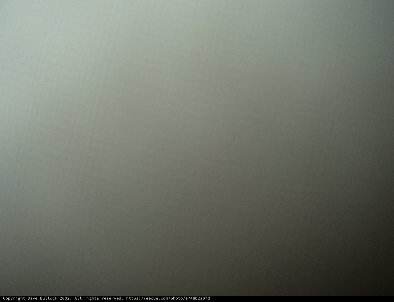 A plane soaring through the mist
