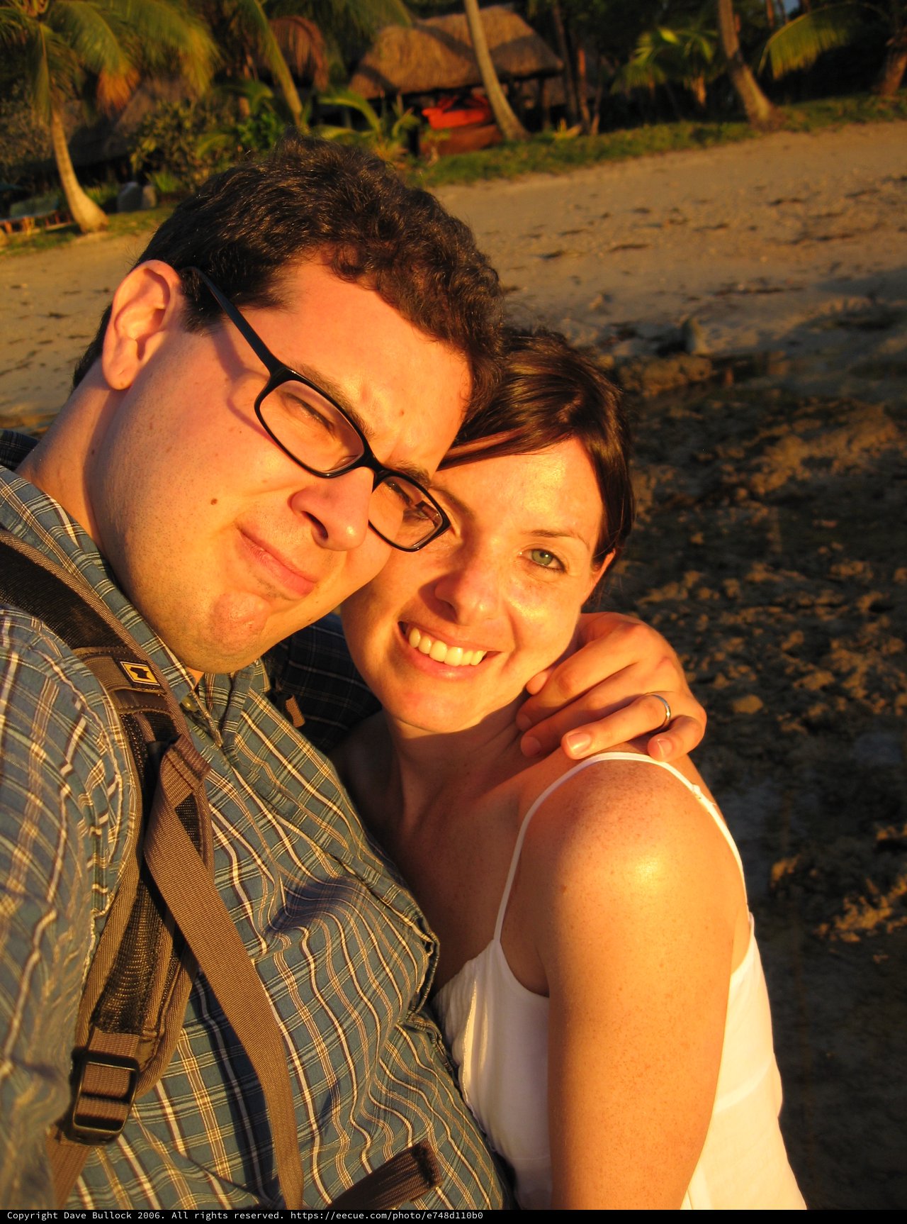 Couple Embracing at Golden Hour on Fiji Beach