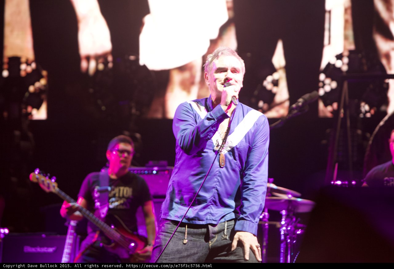Morrissey Singing Blue Shirt Necklaces Bassist Glasses Capitol Tee Red Bass Blackstar Smiths Dangling Hands Screen Guitarist
