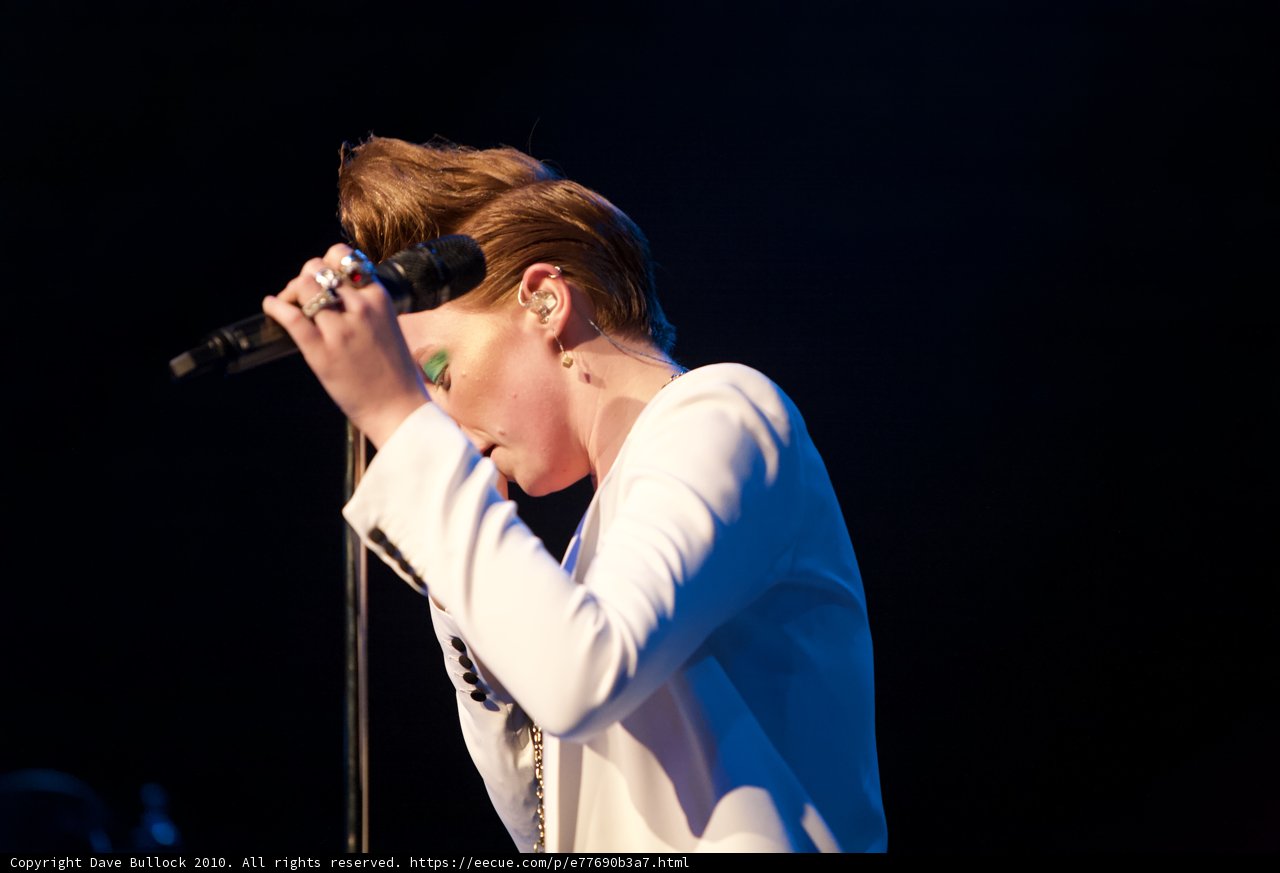 The Solo Songstress with the Microphone