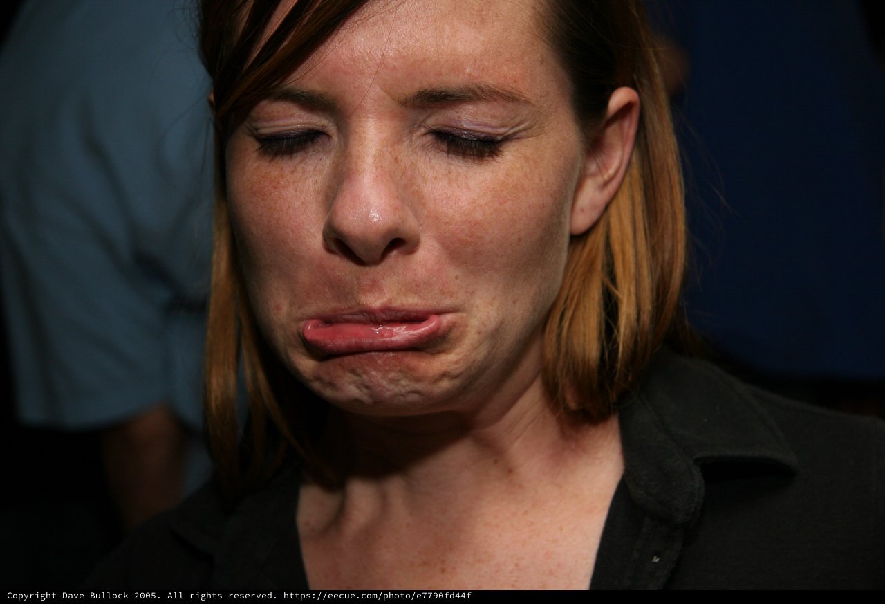 Raw Emotion: Woman in Tears at Public Event