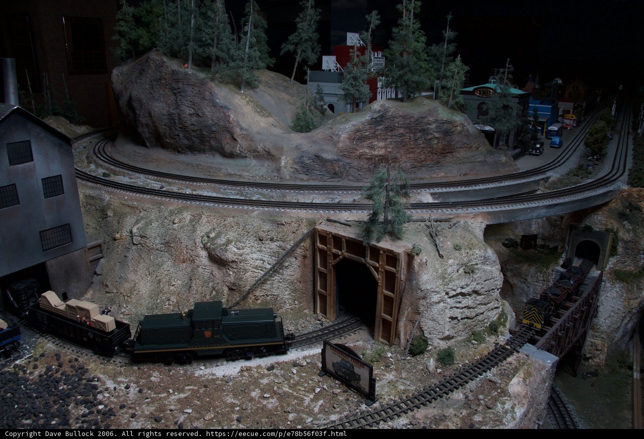 Miniature Train Going Through Tunnel in Diorama