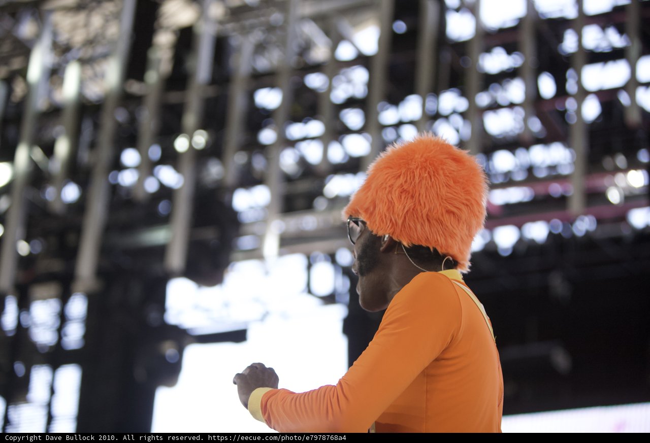Orange-Clothed Man Commands the Stage at Cochella