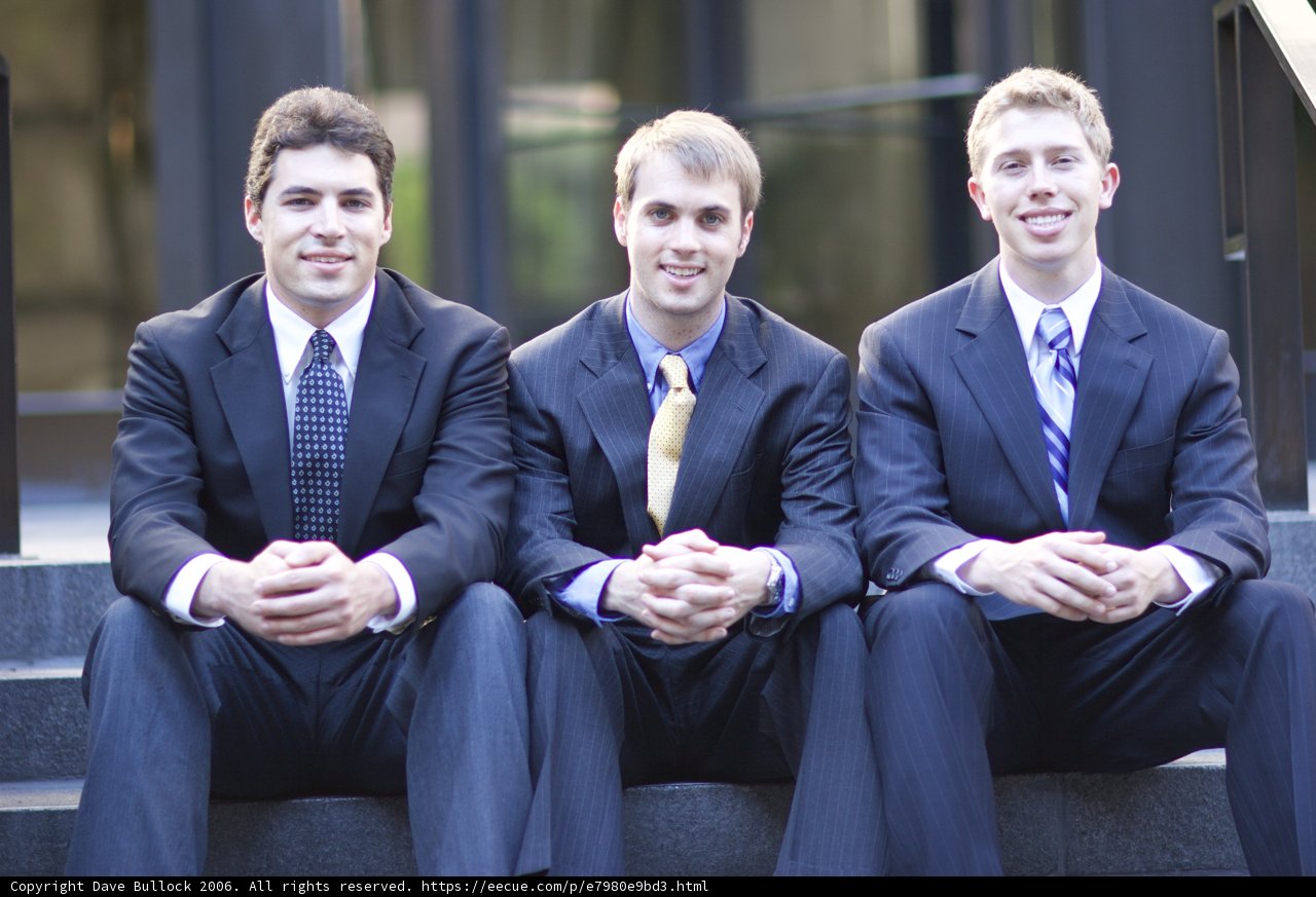 Three Suited Men Take a Break
