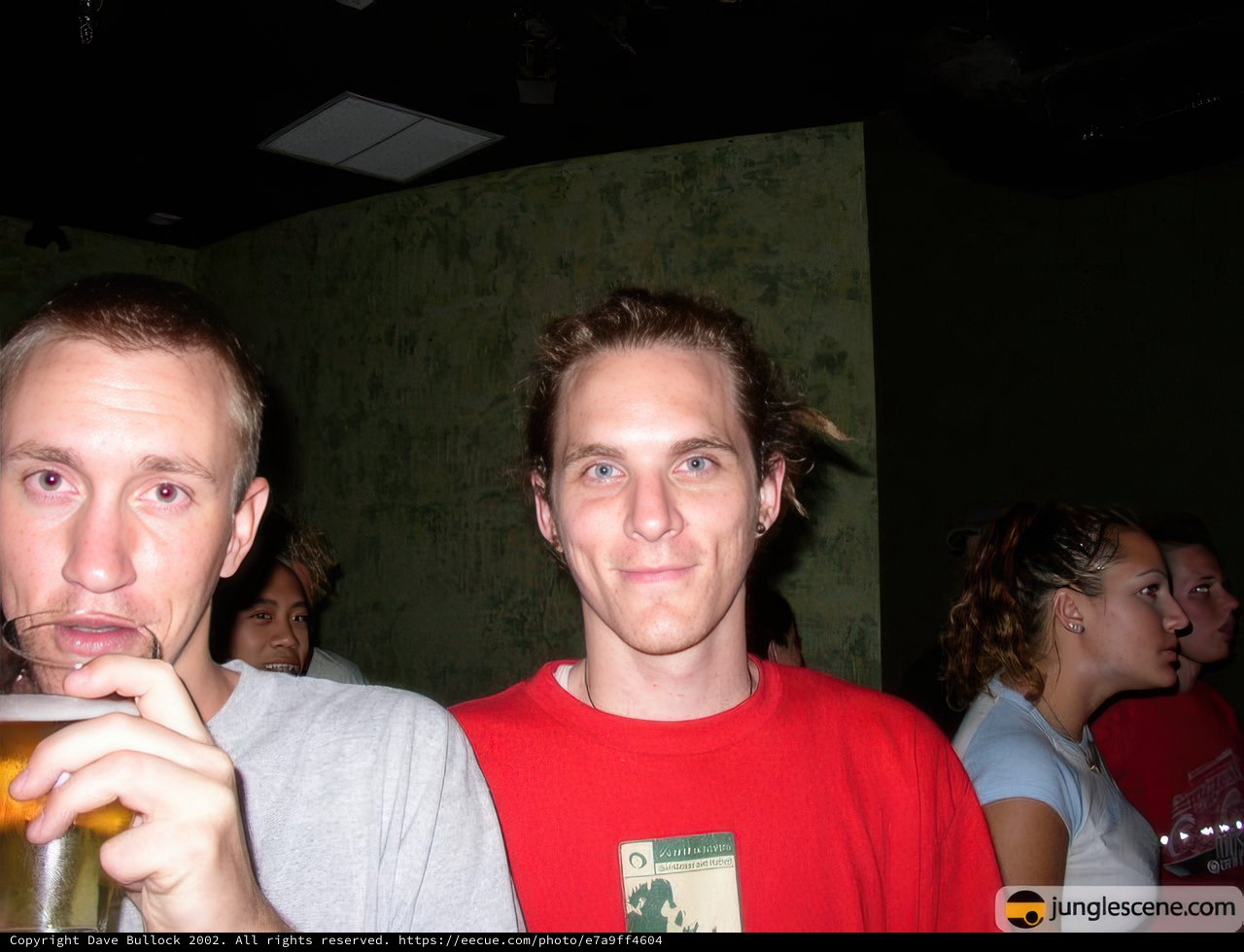 Two Men Toasting at a Party