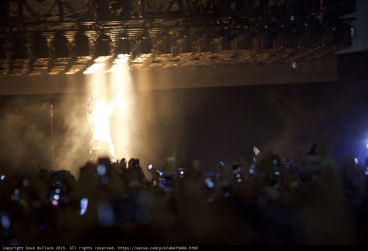 Kanye West Arm Raised Spotlight