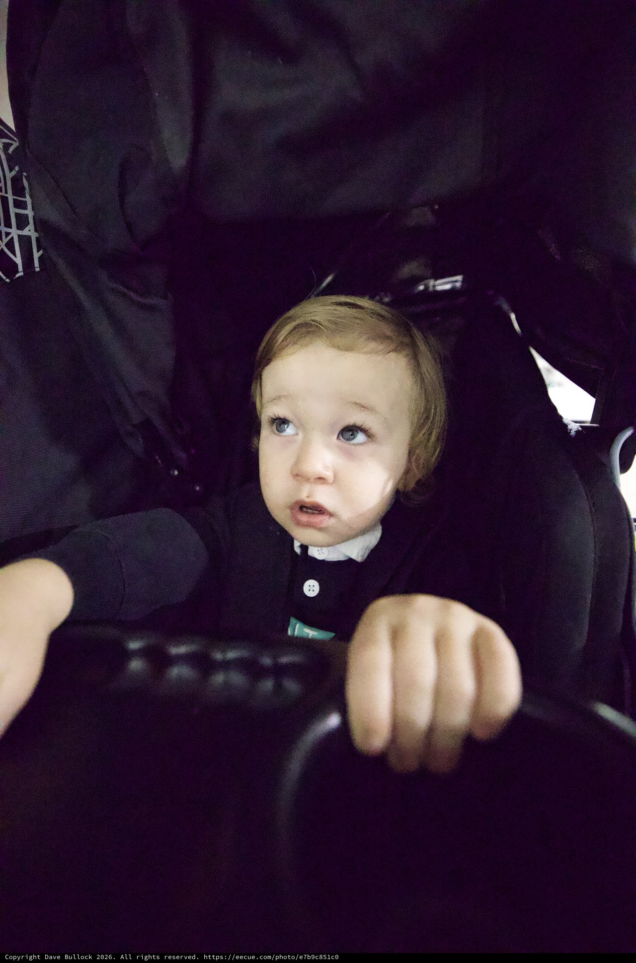 Toddler at Baby Rave Event in Dark Setting