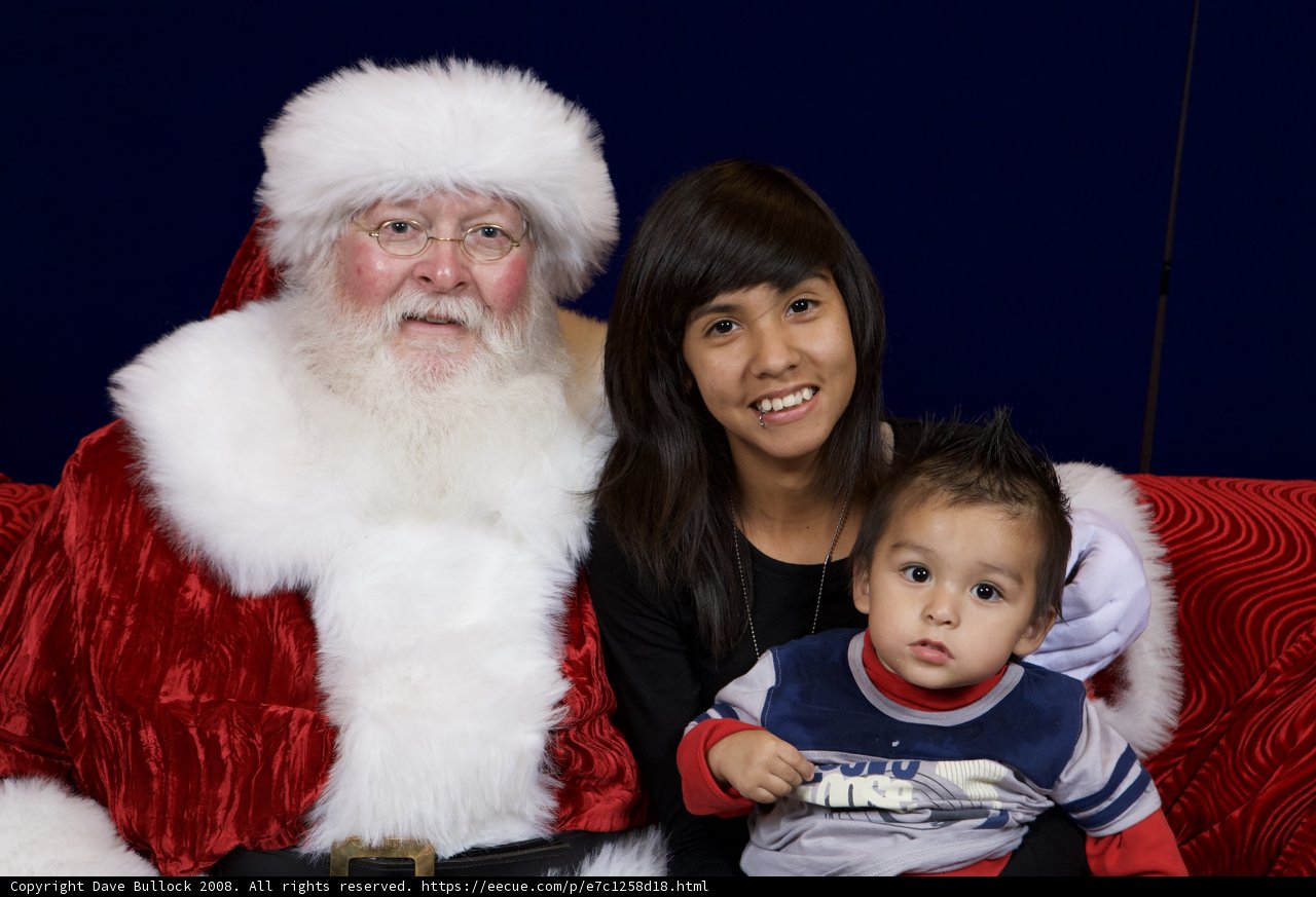 A Festive Family Photo with Santa Claus
