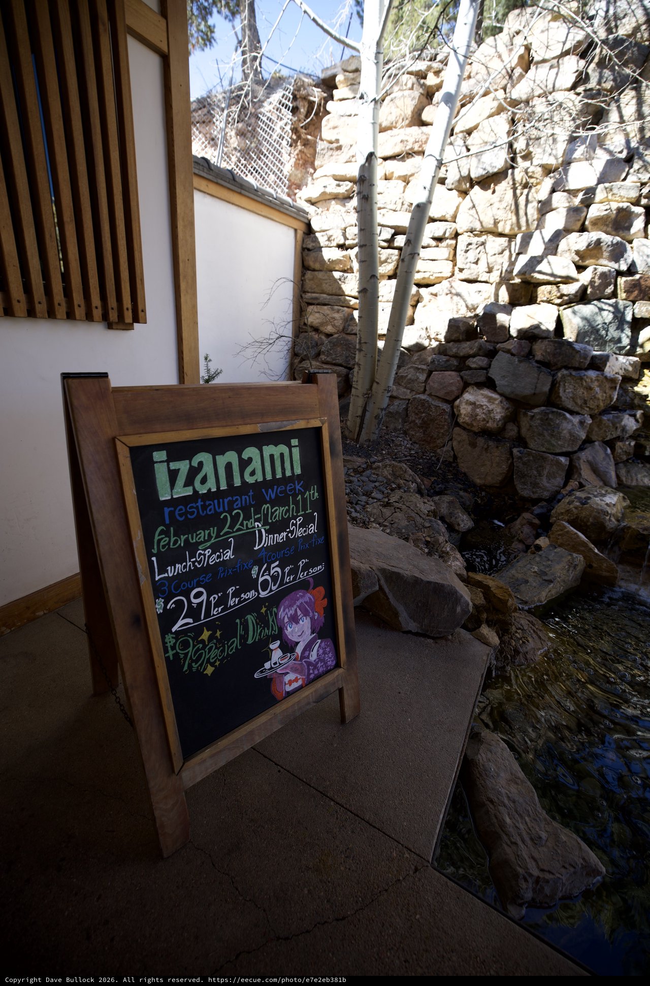 Izanami Restaurant Week Sign in Artistic Stone Courtyard