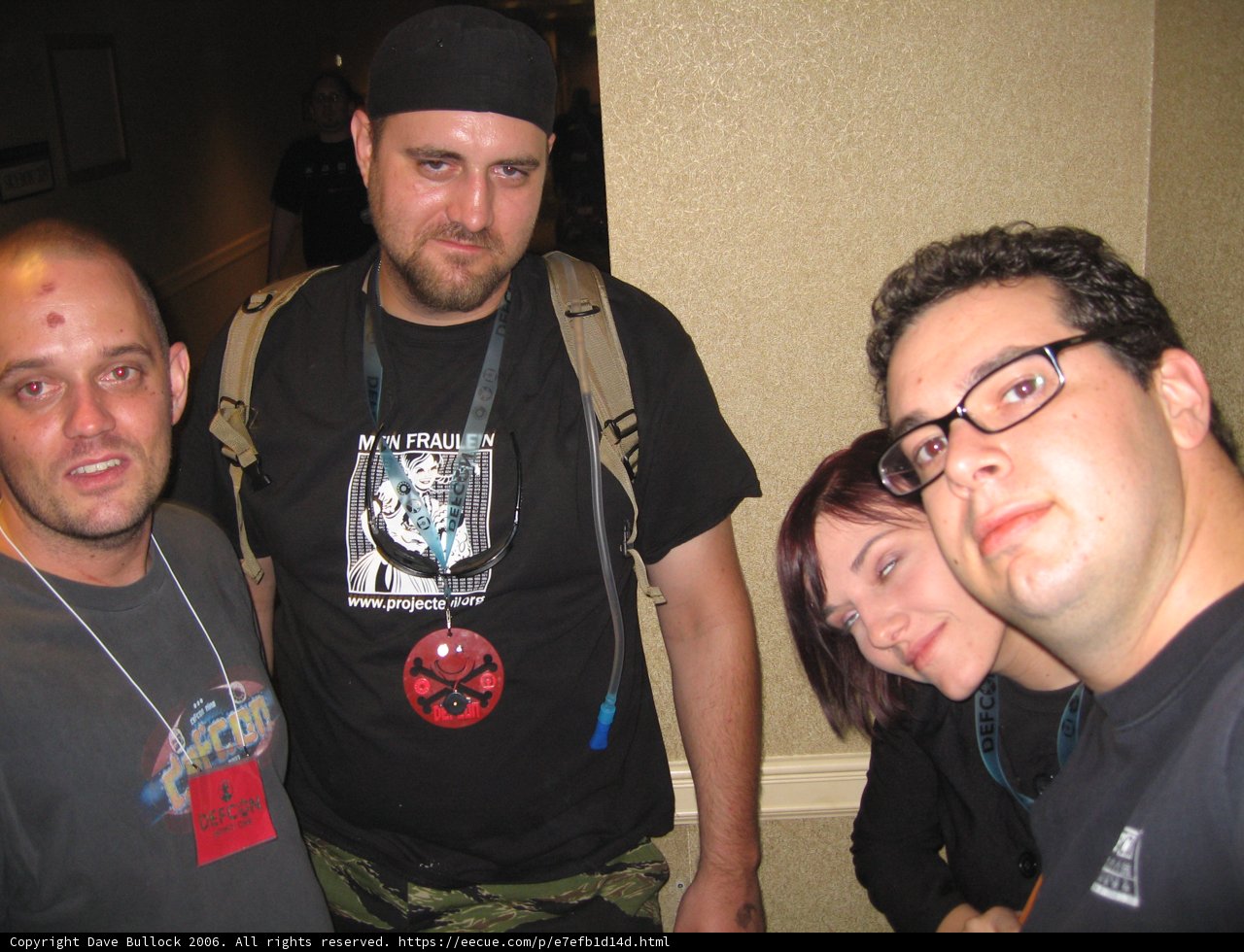 Dave B rocks a classic black shirt and baseball cap