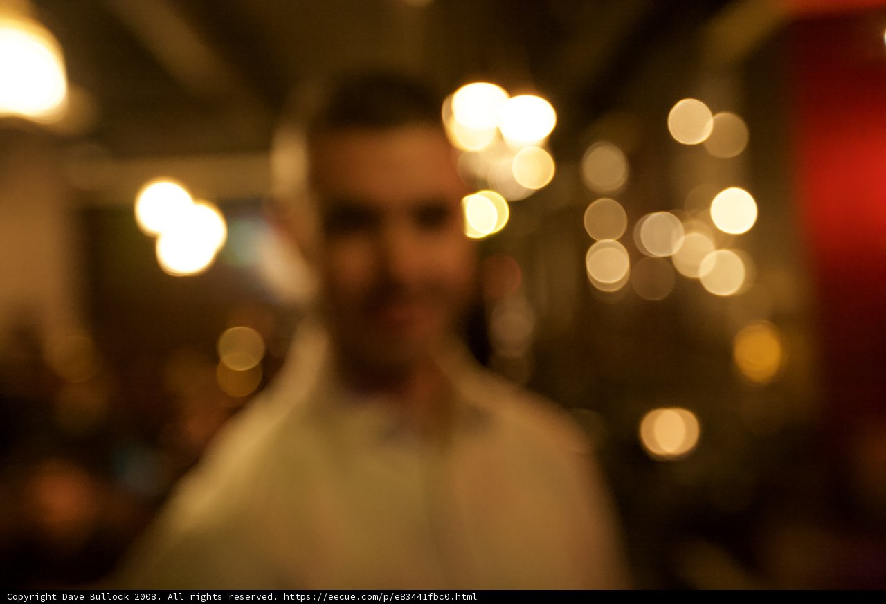Blurred Man in the Urban Nightlife