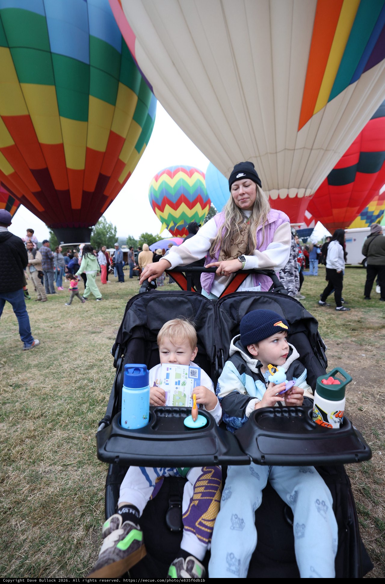 Family Watches Hot Air Balloons at Classic Festival