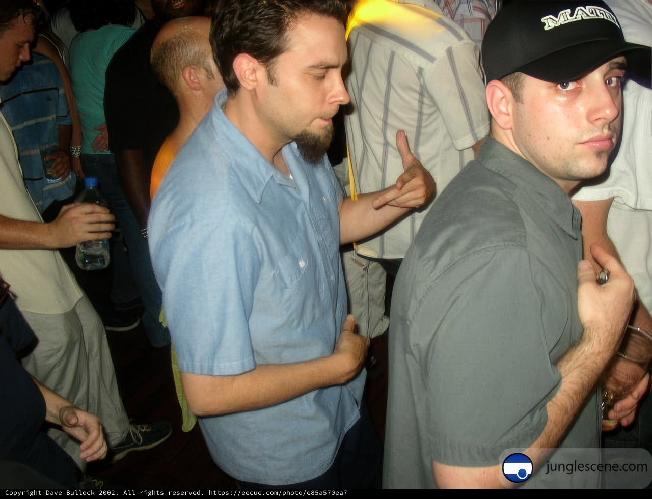 Partygoers in Baseball Caps