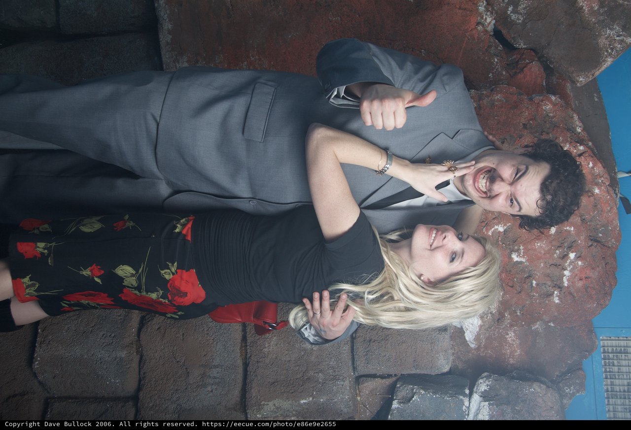 Halloween Party Couple Striking Playful Poses Together