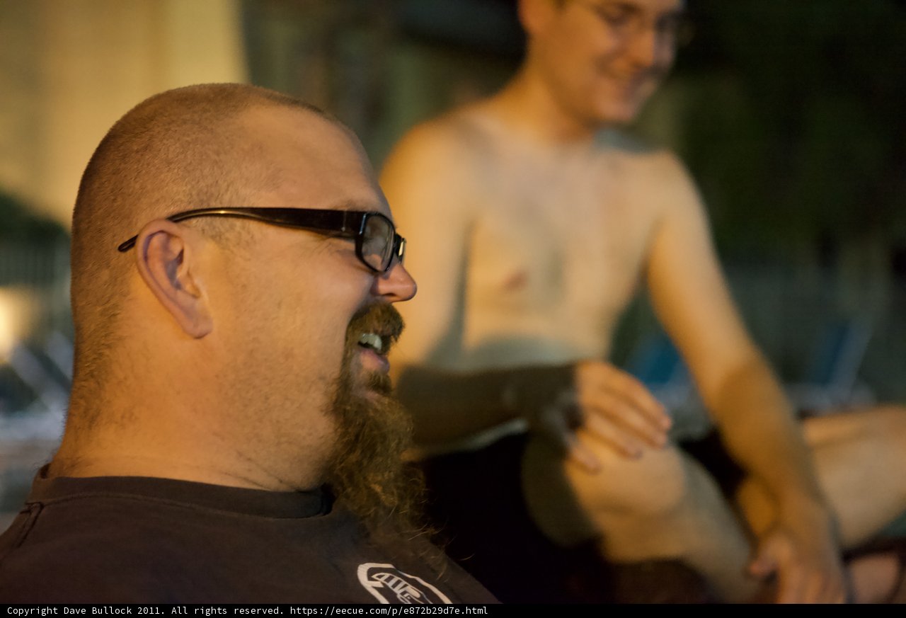 Two Men Deep in Conversation