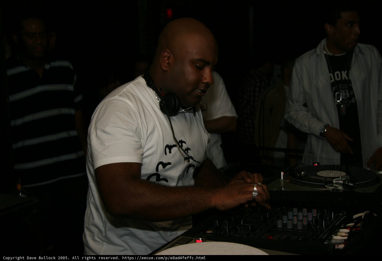 Club DJ Entertaining Crowd with Musical Skill