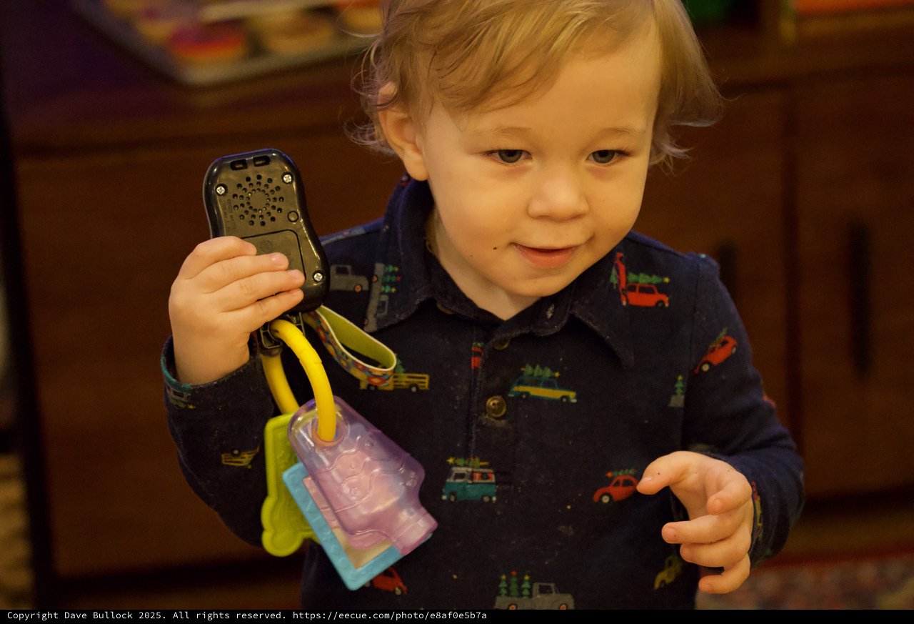 Toddler Playing with Toy Phone on Christmas