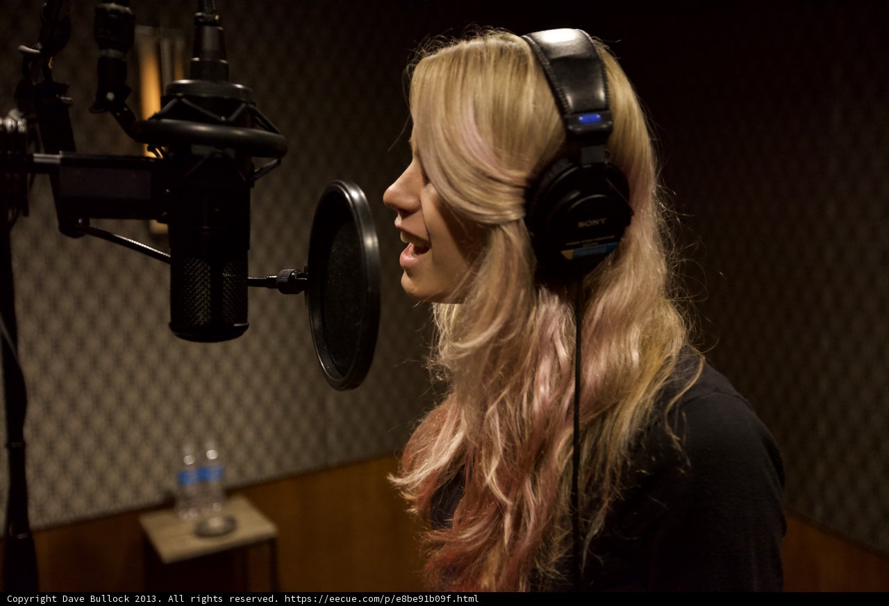 Pink-haired Woman Belting Out a Tune