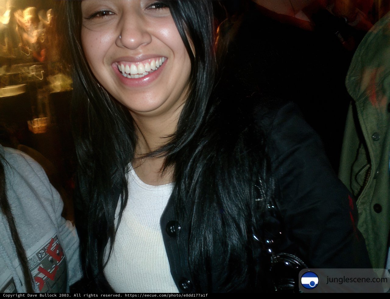 Black-haired beauty in a cozy coat