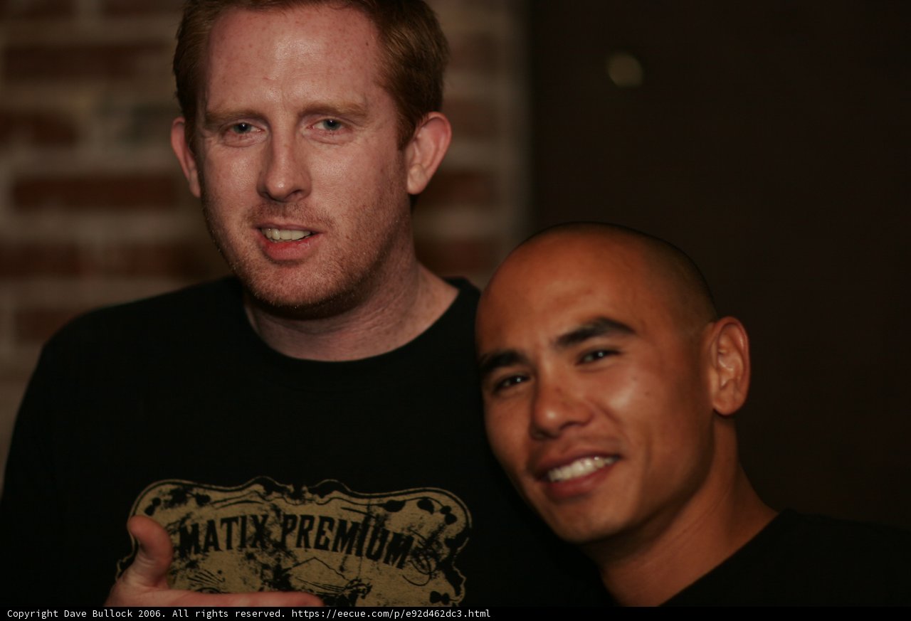Two Smiling Men in T-Shirts