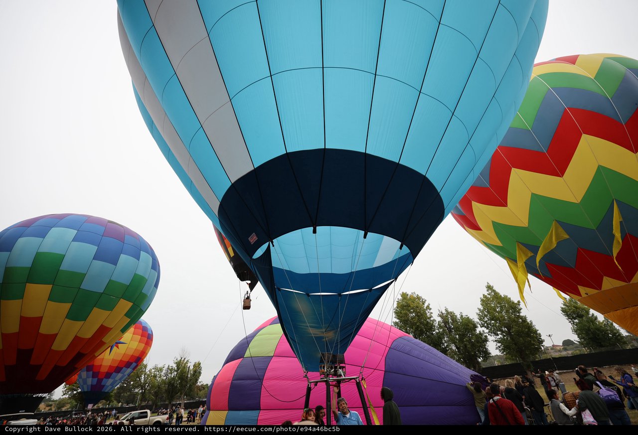 Ground-Level Giants: Hot Air Balloons Ready for Launch