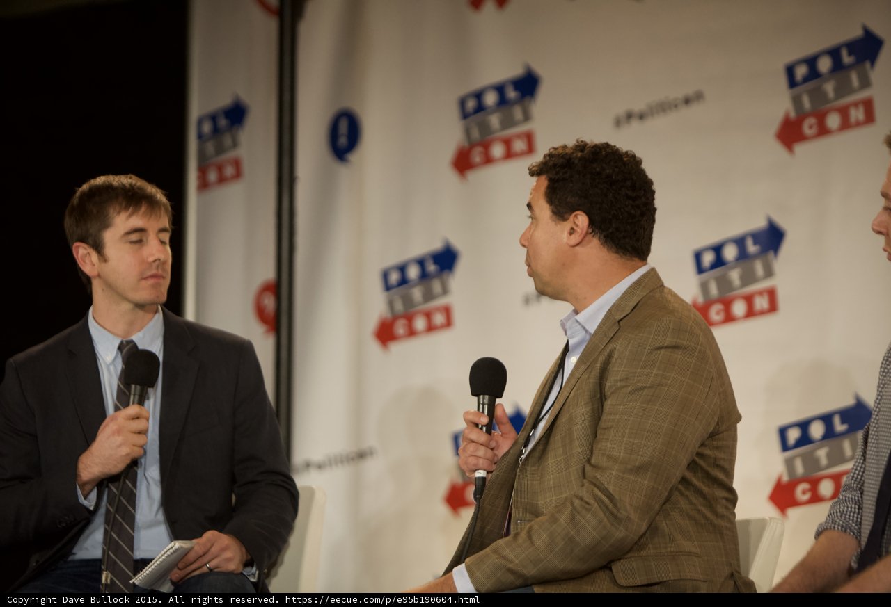 Men Discussing Politics on Stage