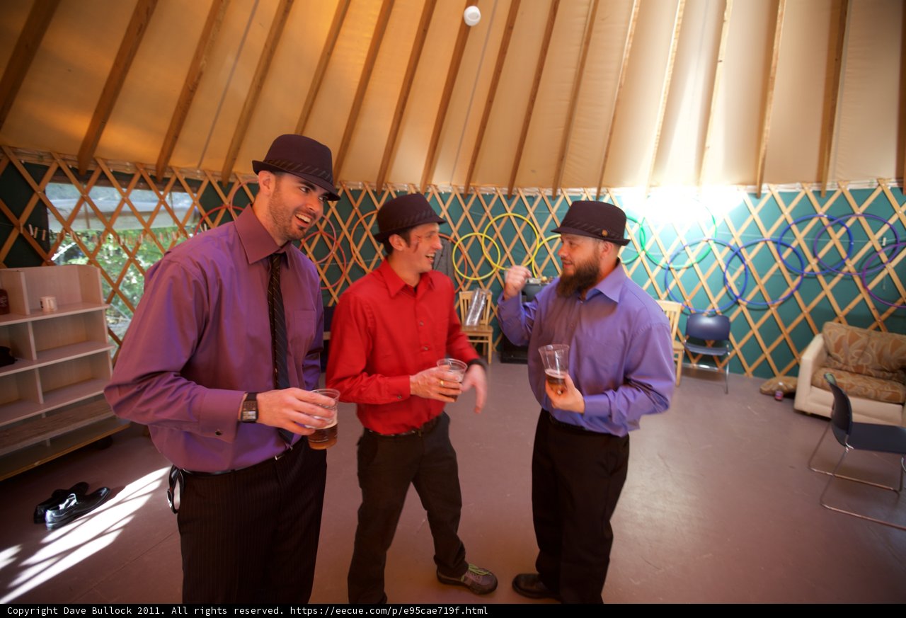 Three Men and Their Hats in the Wedding Reception Room