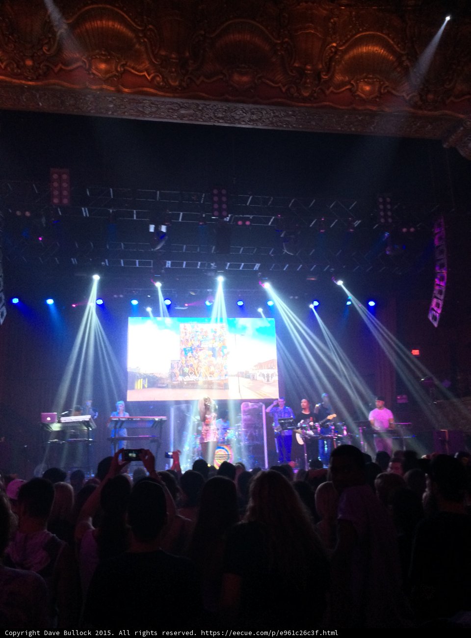 Stage Spotlight Shines on Energetic Crowd at Rock Concert