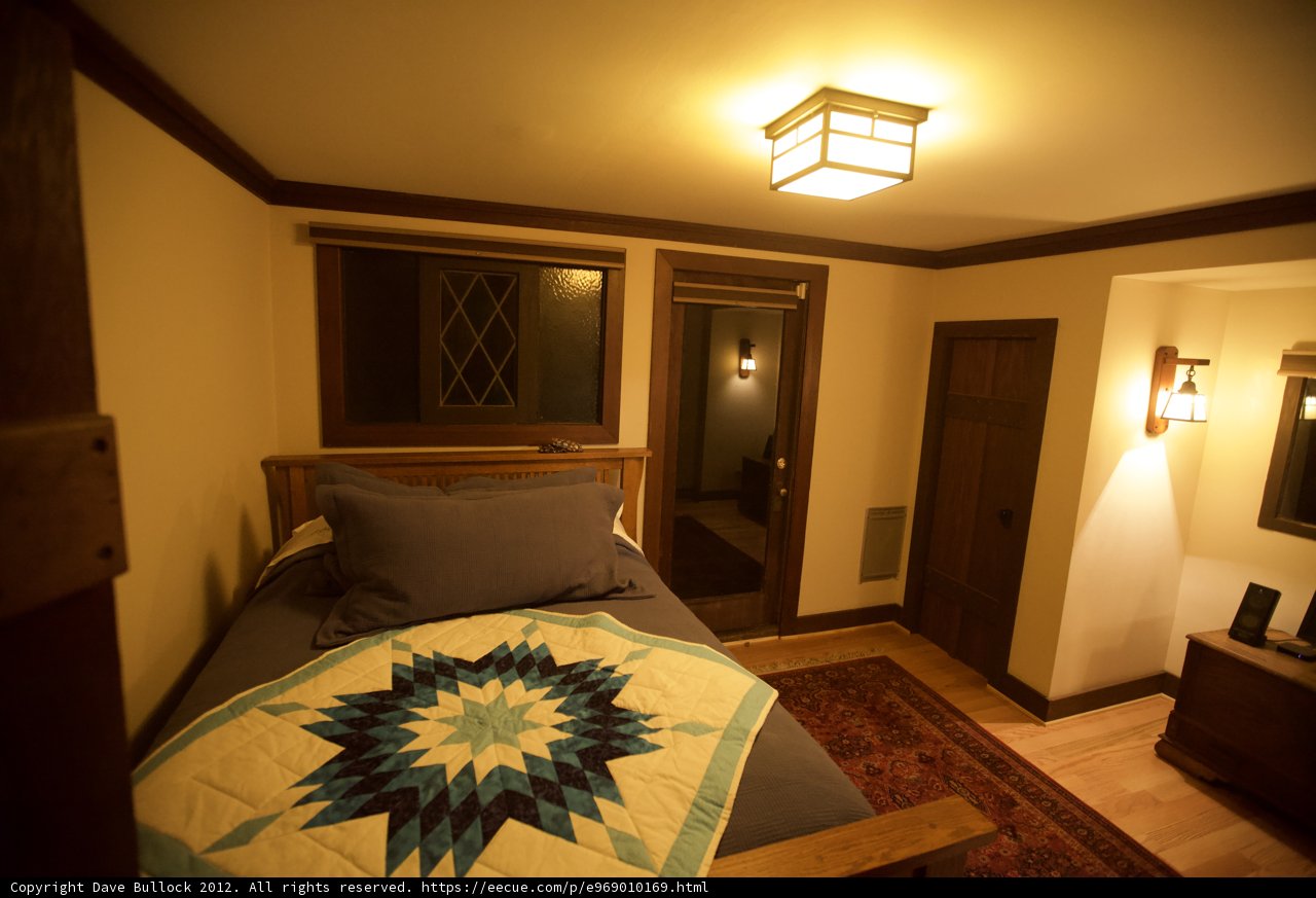 Serene Bedroom with Natural Hardwood Flooring