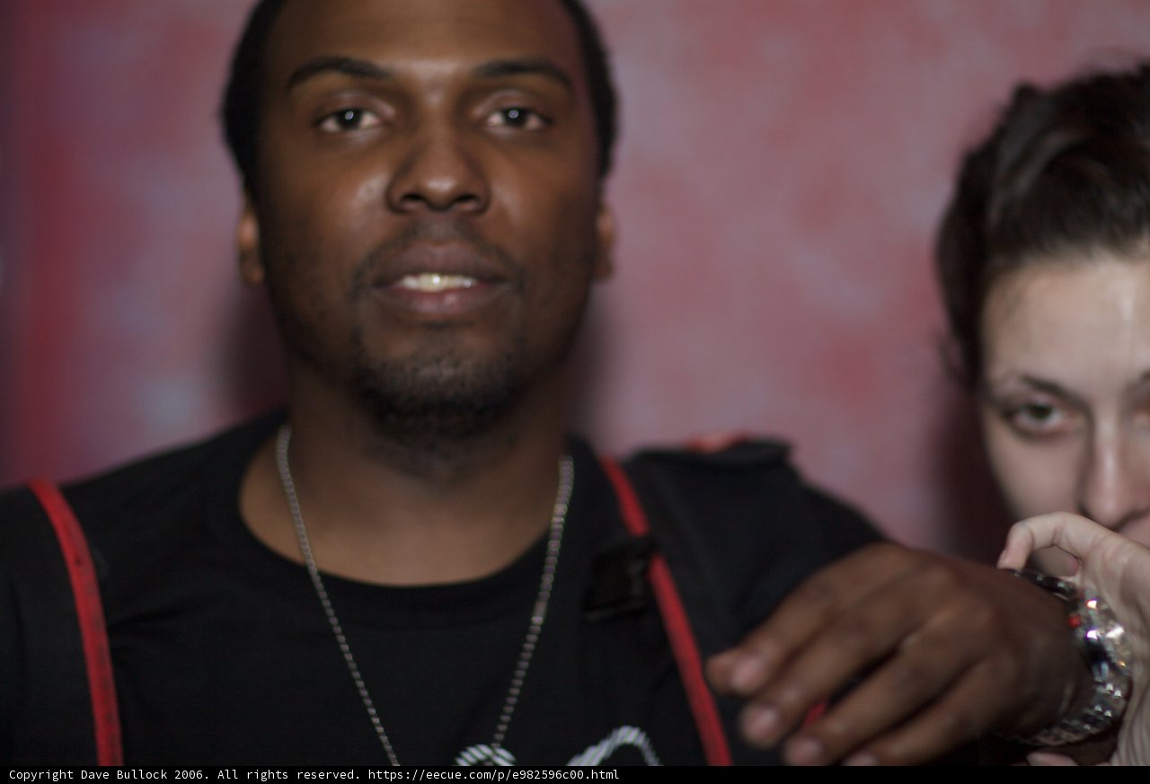 Black Shirt Man with Jewelry