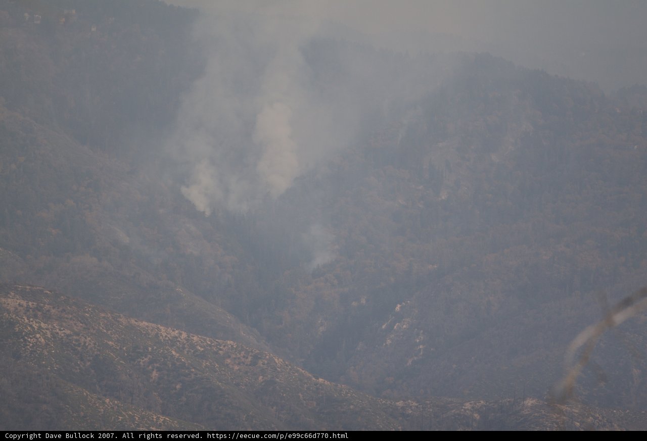 Mountain engulfed in smoke
