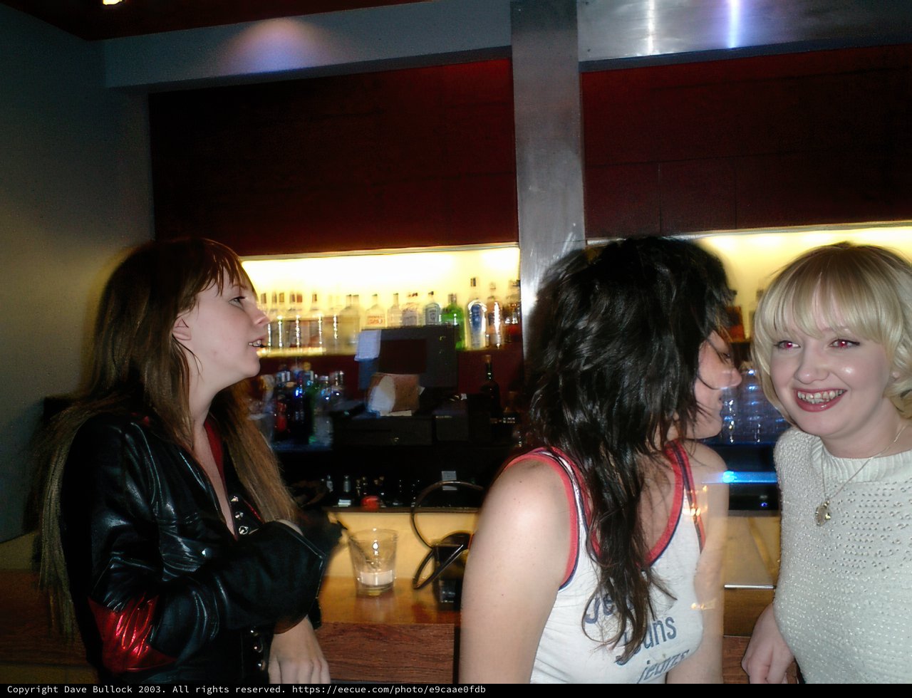 Woman in Chic Black Jacket at Cinespace